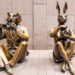 Paparazzi Dogman and Paparazzi Rabbitwoman. Bronze sculptures on Sixth Avenue in New York.