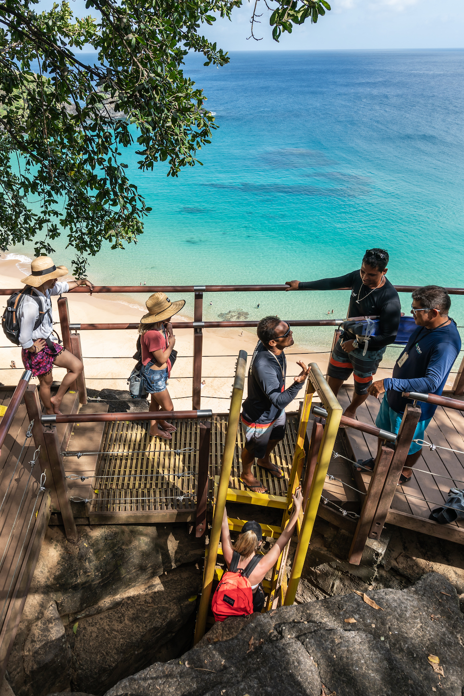 Fernando de Noronha, Pernambuco, Brazil, July 2019 - Stairs to the Beautiful Sancho Beach, with turquoise clear water, at Fernando de Noronha Marine National Park.